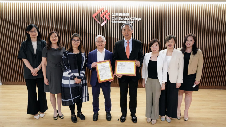 The Head of the Civil Service College and Executive Director of HKCAAVQ, pictured with representatives from CSC and HKCAAVQ to mark a new milestone in civil service training together.